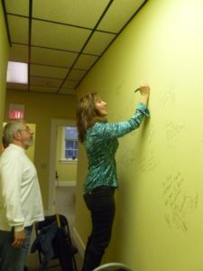 Signing the "Wall of Fame" at Renegade Radio